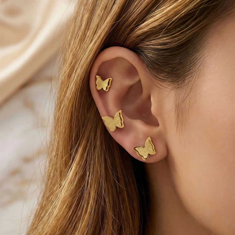 A set of 3 pairs of gold butterflies with a double design, made of rust-resistant stainless steel, with graduated sizes to give you layered styling or to choose the perfect size. - Image 3